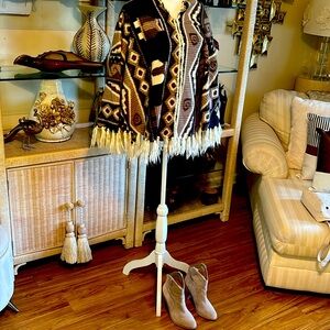 Here is a multi color Shaw with tassel warm and cozy